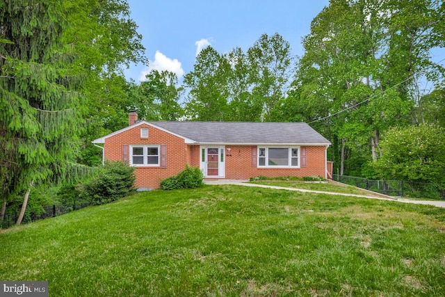 22 Hillside Ct, Huntingtown, MD 20639 - view of front of house featuring a chimney and brick siding