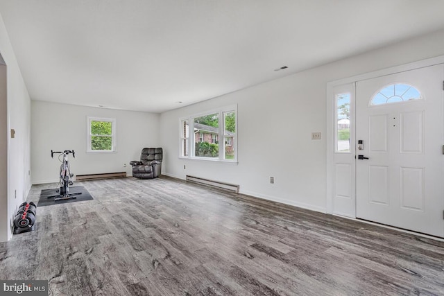 22 Hillside Ct, Huntingtown, MD 20639 - entrance foyer featuring a baseboard radiator, wood finished floors, and baseboards
