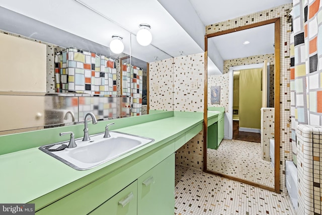 bathroom with vanity and tile patterned flooring