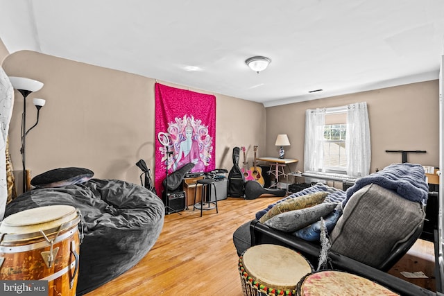 bedroom featuring wood finished floors