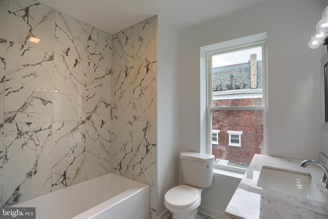 full bathroom with toilet and vanity