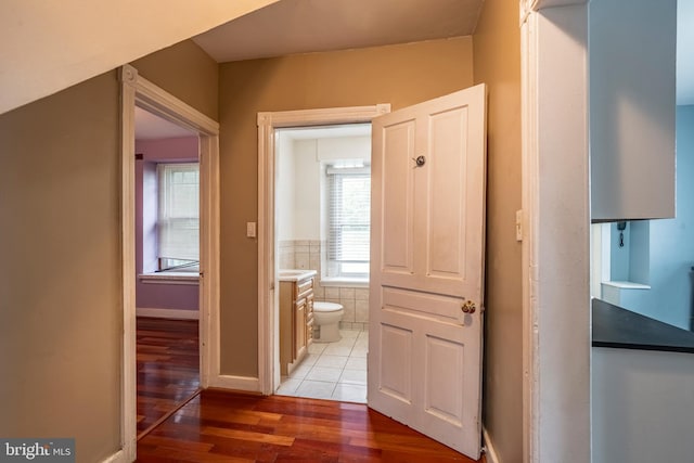 1050 Moravia St, Fountain Hill, PA 18015 - corridor with light wood finished floors and baseboards