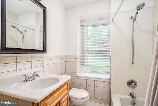 1050 Moravia St, Fountain Hill, PA 18015 - full bathroom with shower / bath combination, toilet, vanity, and a healthy amount of sunlight