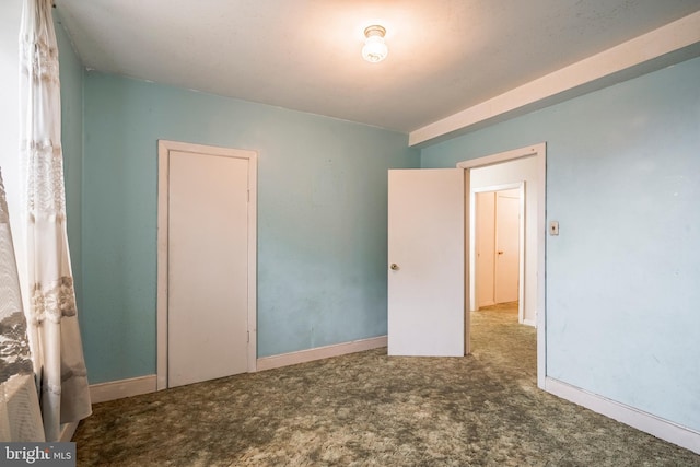 1050 Moravia St, Fountain Hill, PA 18015 - unfurnished bedroom featuring baseboards and carpet floors