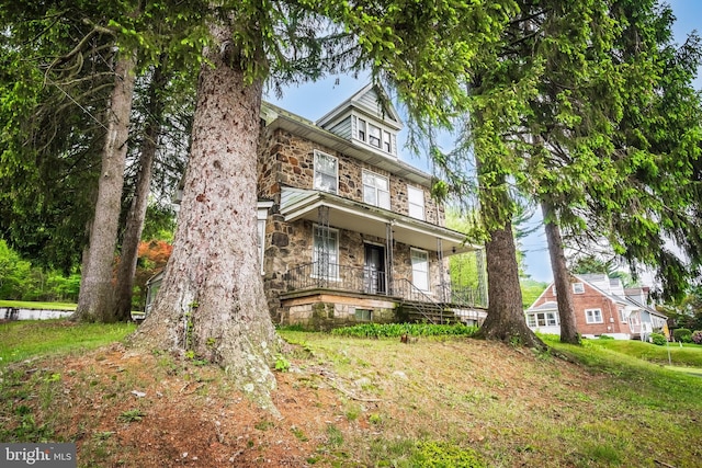 1050 Moravia St, Fountain Hill, PA 18015 - traditional style home with stone siding and a porch