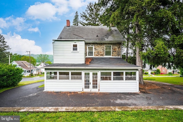1050 Moravia St, Fountain Hill, PA 18015 - rear view of property with a patio area, french doors, and a chimney