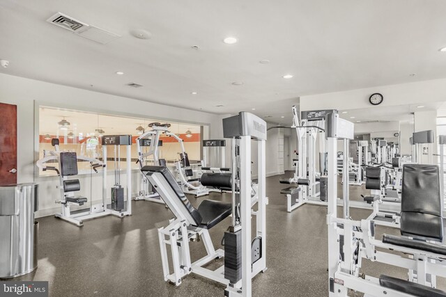 workout area with visible vents and recessed lighting