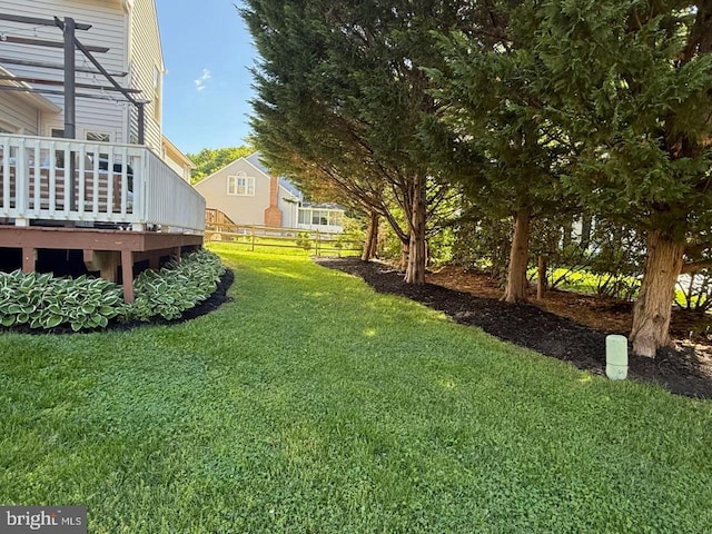 view of yard with a deck