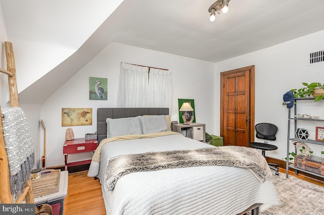 bedroom with light wood-style flooring