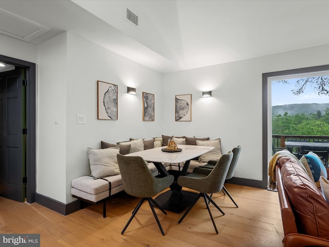 209 Hogan Dr, Basye, VA 22810 - dining space with light wood-style floors and baseboards