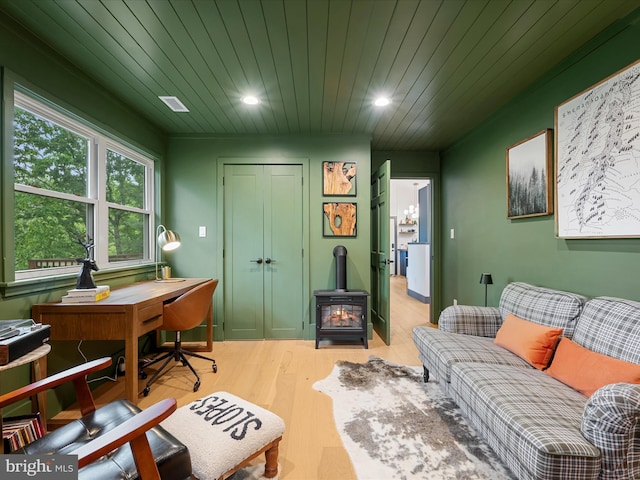 209 Hogan Dr, Basye, VA 22810 - office with a wood stove, light wood-style flooring, recessed lighting, and wooden ceiling