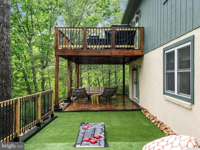 209 Hogan Dr, Basye, VA 22810 - view of green lawn featuring a deck and outdoor lounge area