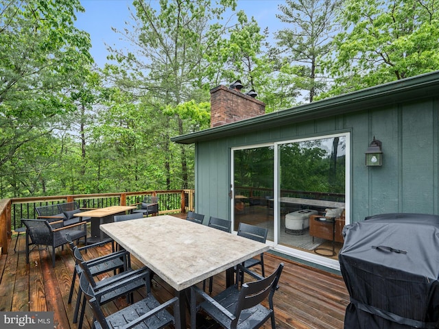 209 Hogan Dr, Basye, VA 22810 - deck featuring outdoor dining space and area for grilling