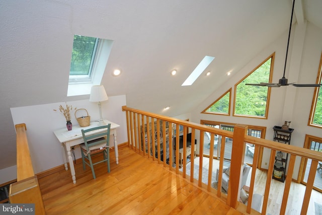 2119 Rock Lodge Rd, Mc Henry, MD 21541 - hall featuring a skylight, an upstairs landing, hardwood / wood-style flooring, recessed lighting, and high vaulted ceiling