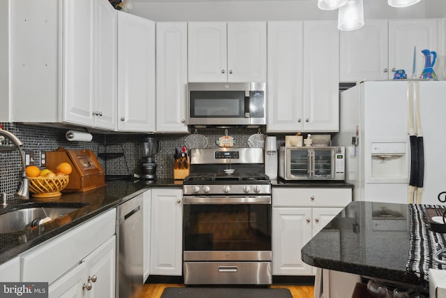 5533 Westcott Cir, Frederick, MD 21703 - kitchen featuring appliances with stainless steel finishes, white cabinetry, and a sink