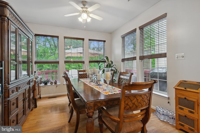 5533 Westcott Cir, Frederick, MD 21703 - dining area featuring light wood-style floors, a ceiling fan, and baseboards