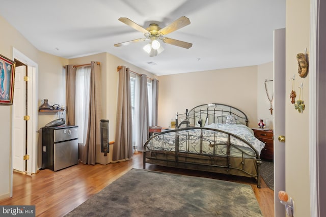 5533 Westcott Cir, Frederick, MD 21703 - bedroom with wood finished floors and a ceiling fan