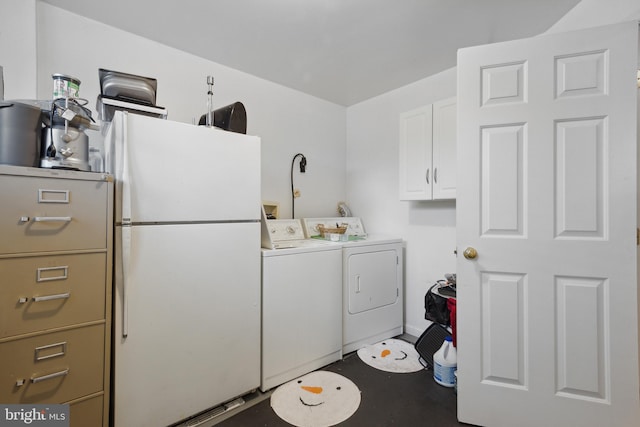 5533 Westcott Cir, Frederick, MD 21703 - clothes washing area featuring separate washer and dryer and cabinet space