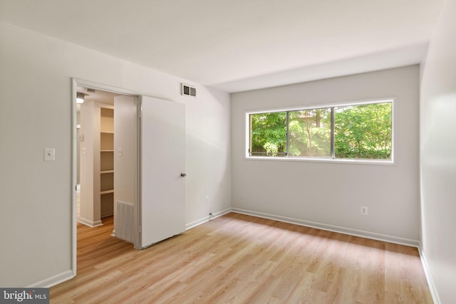 4931 Americana Dr Unit 4931B, Annandale, VA 22003 - empty room with light wood-style floors and baseboards