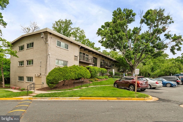4931 Americana Dr Unit 4931B, Annandale, VA 22003 - view of building exterior with uncovered parking