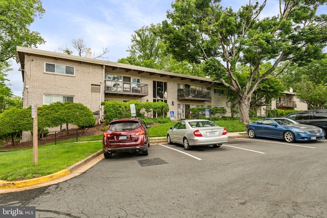 4931 Americana Dr Unit 4931B, Annandale, VA 22003 - view of building exterior featuring uncovered parking
