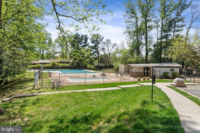 4931 Americana Dr Unit 4931B, Annandale, VA 22003 - view of community featuring a pool and a patio area