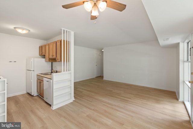 4931 Americana Dr Unit 4931B, Annandale, VA 22003 - kitchen with white appliances, ceiling fan, light wood-type flooring, baseboards, and light countertops
