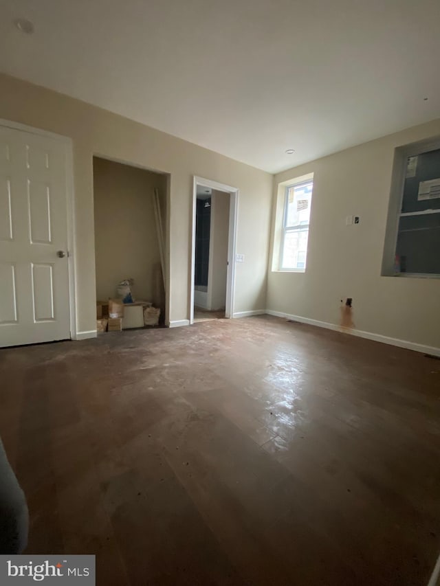 2710 Jefferson St, Baltimore, MD 21205 - unfurnished living room featuring baseboards