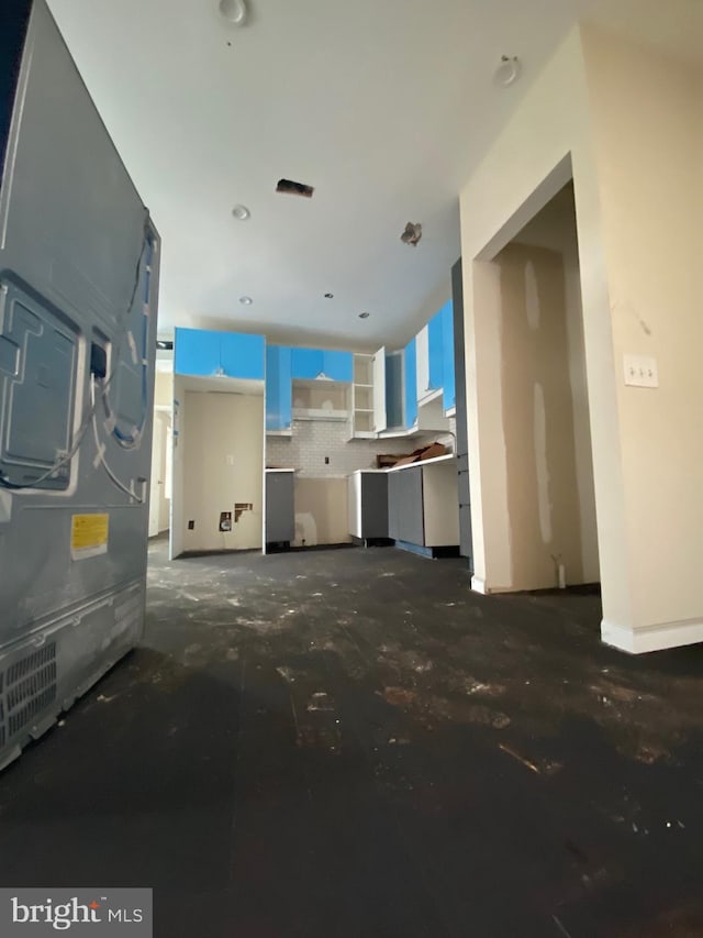 2710 Jefferson St, Baltimore, MD 21205 - unfurnished living room with heating unit and baseboards