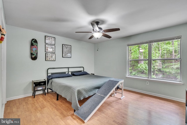486 Round Up Rd, Lusby, MD 20657 - bedroom featuring light wood-style floors, baseboards, and ceiling fan