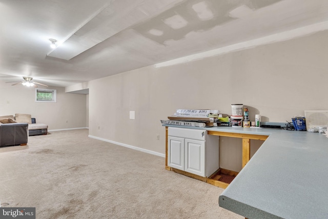 486 Round Up Rd, Lusby, MD 20657 - kitchen featuring open floor plan, light carpet, baseboards, and light countertops
