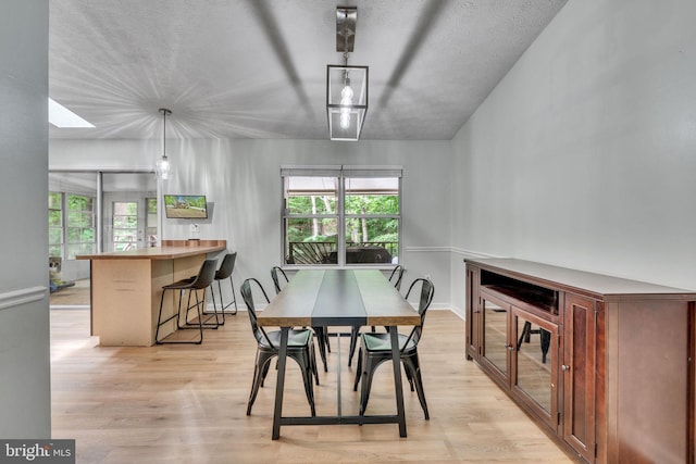 486 Round Up Rd, Lusby, MD 20657 - dining area featuring light wood finished floors and baseboards