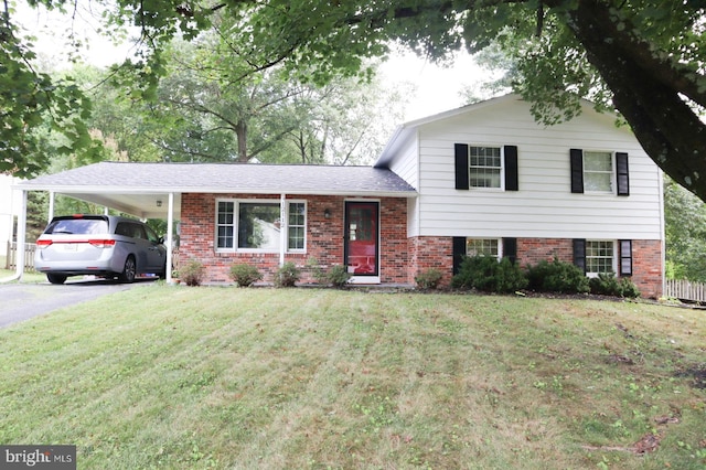 12112 Bayswater Rd, Gaithersburg, MD 20878 - tri-level home featuring brick siding, a front yard, asphalt driveway, and an attached carport