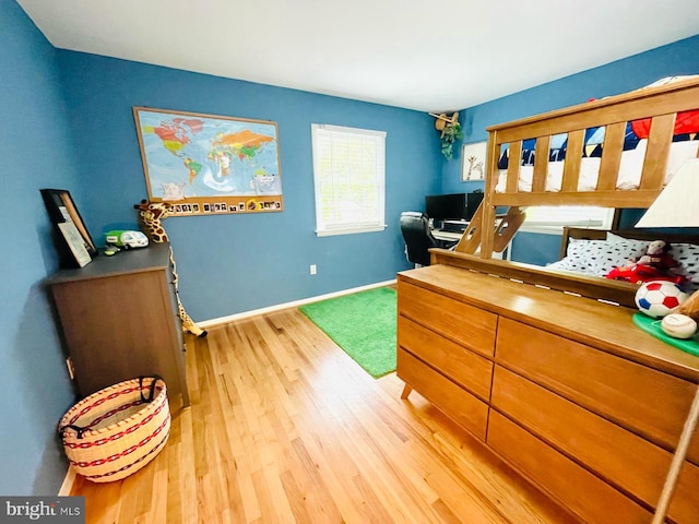 12112 Bayswater Rd, Gaithersburg, MD 20878 - bedroom with wood finished floors and baseboards