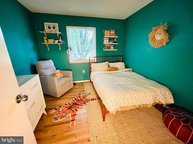 12112 Bayswater Rd, Gaithersburg, MD 20878 - bedroom with wood finished floors and baseboards