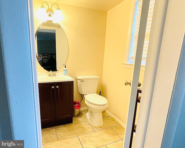 12112 Bayswater Rd, Gaithersburg, MD 20878 - half bath with tile patterned flooring, toilet, and vanity