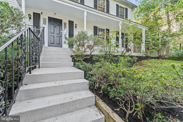 property entrance with a porch