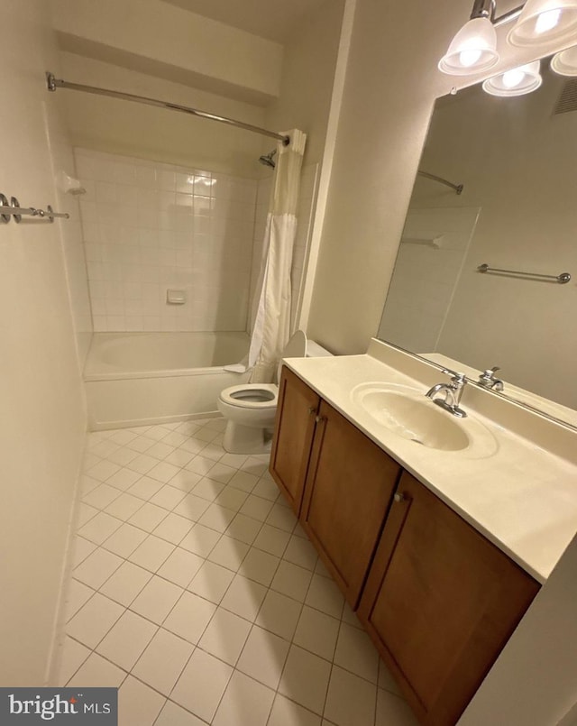 bathroom featuring toilet, shower / tub combo with curtain, visible vents, tile patterned flooring, and vanity