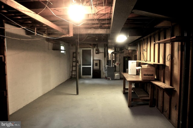 below grade area with heating unit and water heater