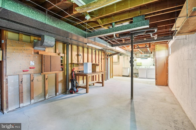 Dauphine St, Silver Spring, MD 20906 - unfinished basement featuring separate washer and dryer