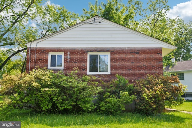Dauphine St, Silver Spring, MD 20906 - view of side of property featuring brick siding
