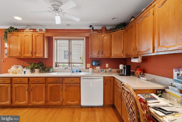 87 Ash Rd, Manahawkin, NJ 08050 - kitchen with white dishwasher, light countertops, brown cabinets, light wood finished floors, and ceiling fan
