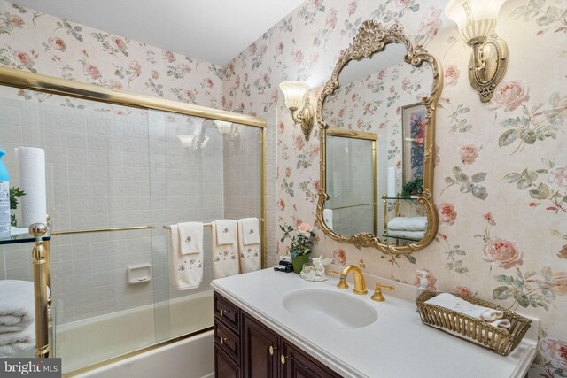 87 Ash Rd, Manahawkin, NJ 08050 - bathroom featuring wallpapered walls, vanity, and combined bath / shower with glass door