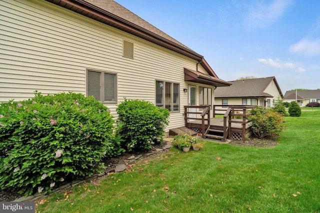 87 Ash Rd, Manahawkin, NJ 08050 - back of house featuring a deck and a yard