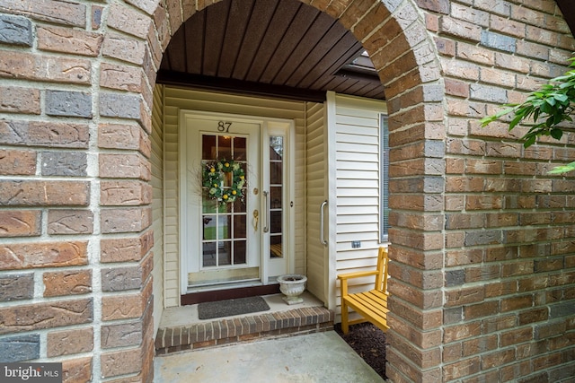 87 Ash Rd, Manahawkin, NJ 08050 - view of exterior entry featuring brick siding