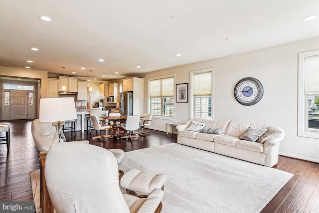 10809 Glowing Hearth Way, Monrovia, MD 21770 - living room with dark wood-type flooring, recessed lighting, and baseboards