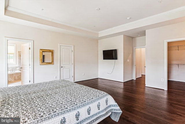 10809 Glowing Hearth Way, Monrovia, MD 21770 - bedroom with ornamental molding, wood finished floors, baseboards, a walk in closet, and a raised ceiling