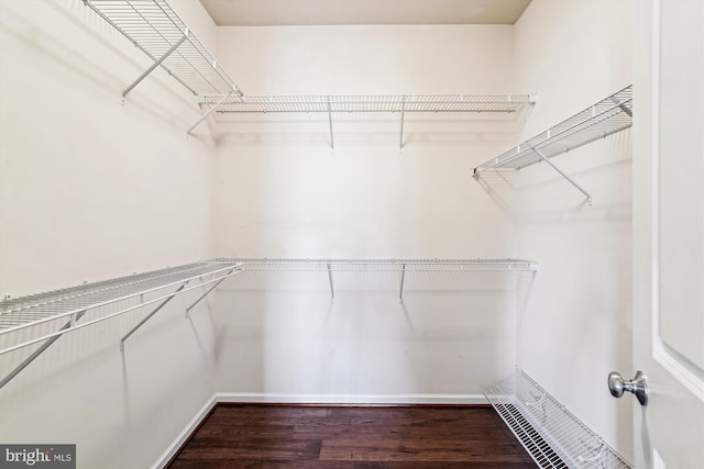 10809 Glowing Hearth Way, Monrovia, MD 21770 - walk in closet featuring wood finished floors