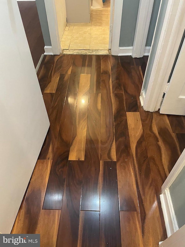 room details featuring wood finished floors and baseboards