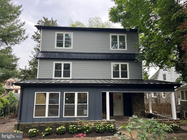 160 Union Ave, Bala Cynwyd, PA 19004 - view of front of home with a standing seam roof, metal roof, board and batten siding, and stone siding